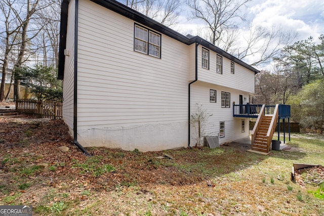 rear view of house with a deck