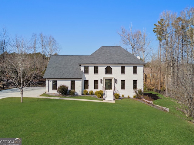 view of front of home with a front yard