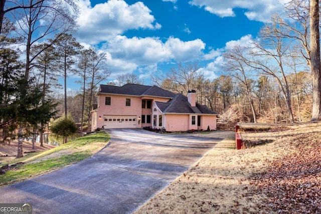 view of front of property with a garage