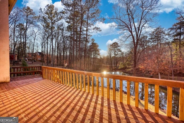 wooden terrace with a water view