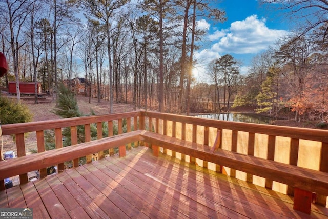 wooden deck with a water view