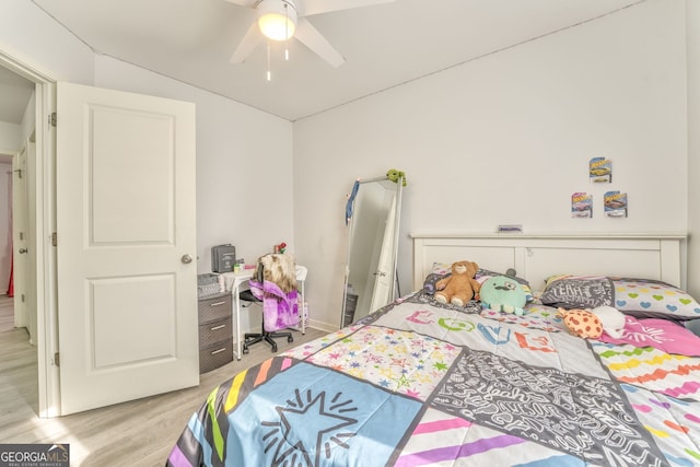 bedroom featuring light hardwood / wood-style flooring and ceiling fan