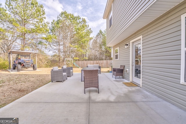 view of patio featuring a playground and outdoor lounge area