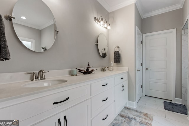 bathroom with crown molding and vanity