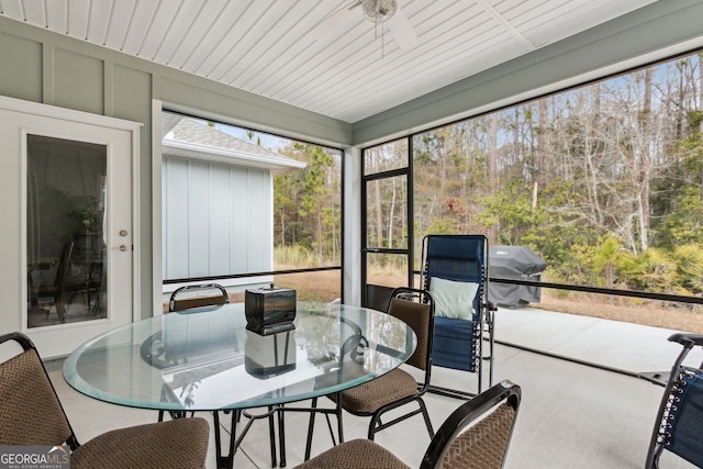 sunroom / solarium featuring a wealth of natural light