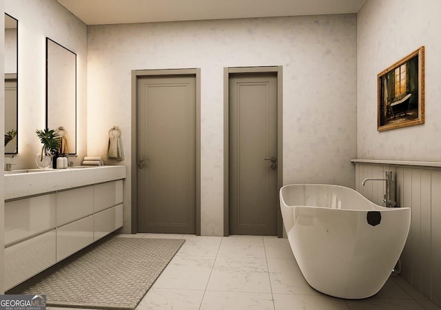 bathroom featuring vanity and a tub