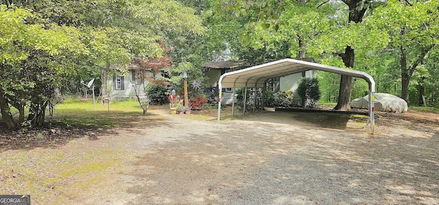 190 Creekwood Rd, Winder, GA 30680 - view of yard featuring driveway and a detached carport