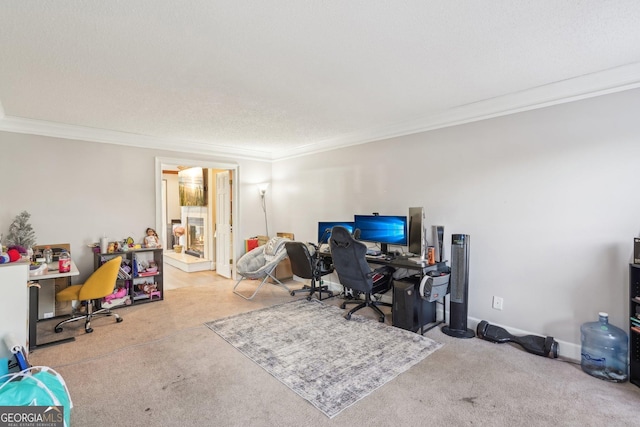 carpeted office featuring crown molding and a textured ceiling