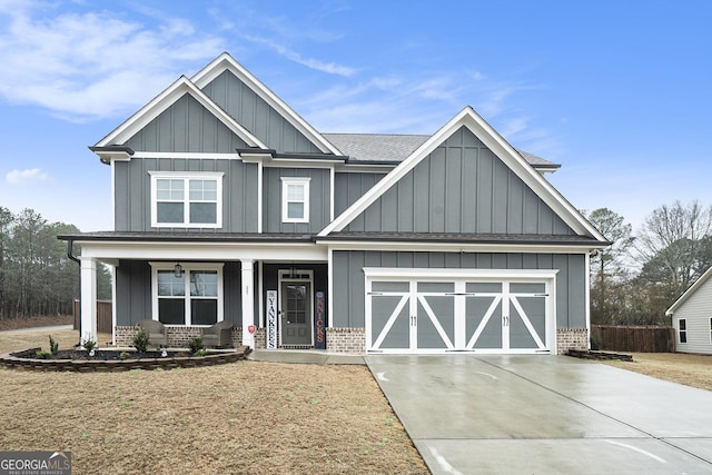 craftsman inspired home with a porch and a garage