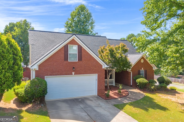 view of front of property with a garage