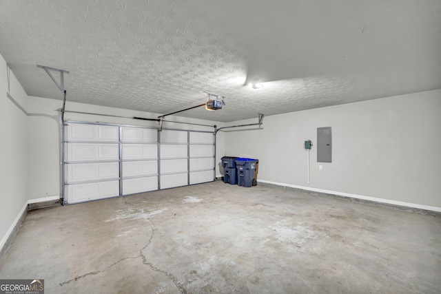 garage featuring a garage door opener and electric panel