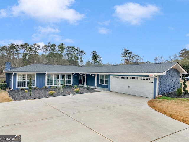 single story home with a garage