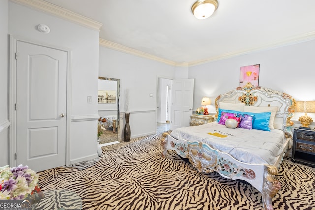 bedroom with carpet floors and ornamental molding