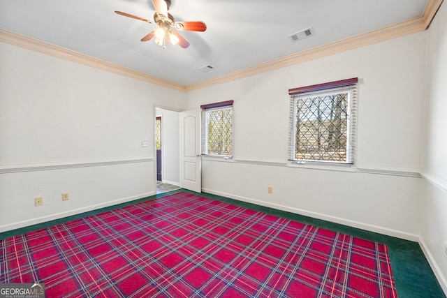 unfurnished bedroom with crown molding, ceiling fan, and carpet flooring