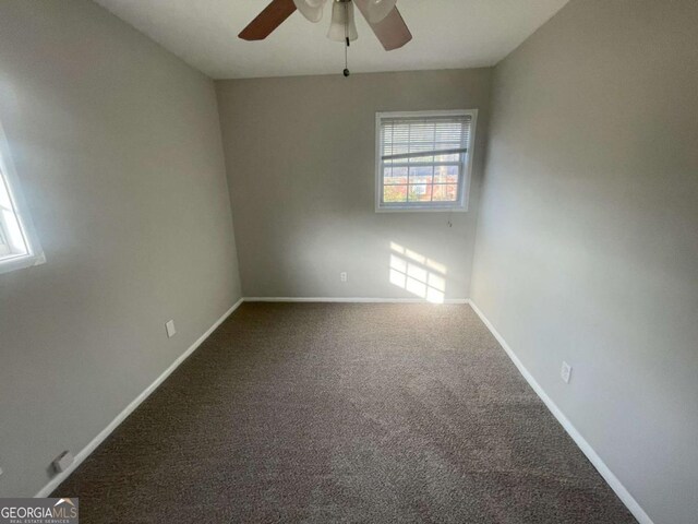 corridor featuring dark hardwood / wood-style floors