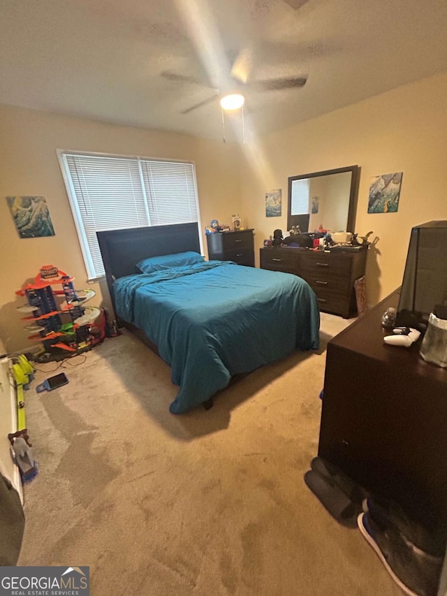 bedroom featuring carpet floors and ceiling fan