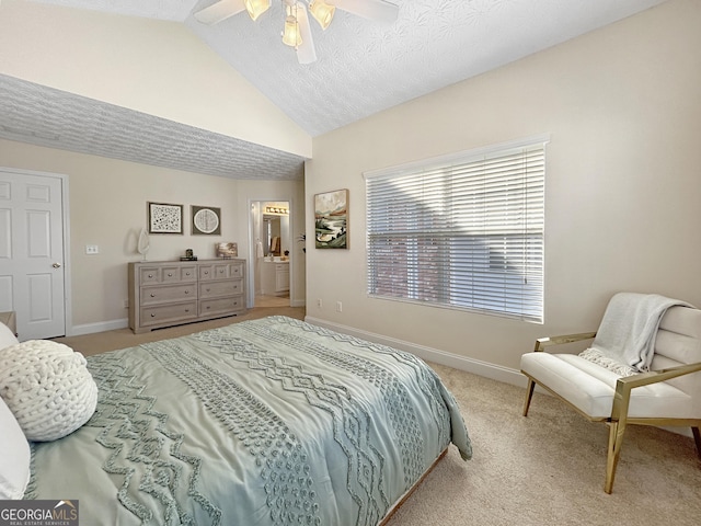 bedroom featuring lofted ceiling, light carpet, a textured ceiling, and baseboards