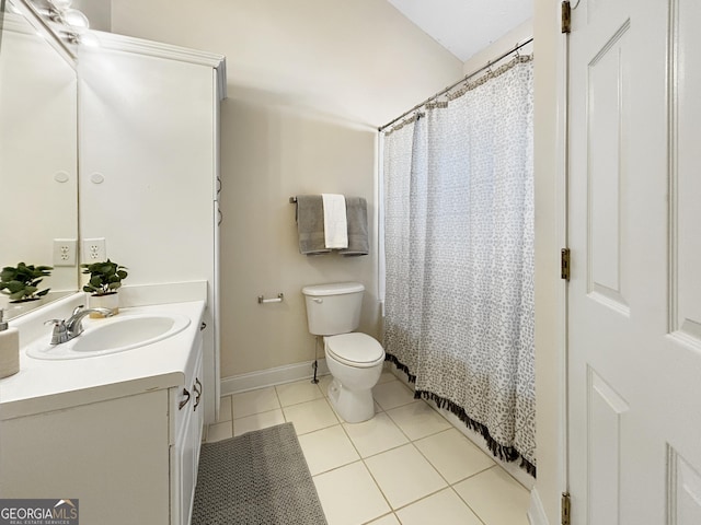 full bath with curtained shower, toilet, vanity, baseboards, and tile patterned floors