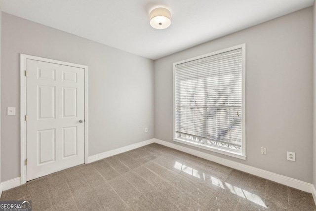 view of carpeted spare room