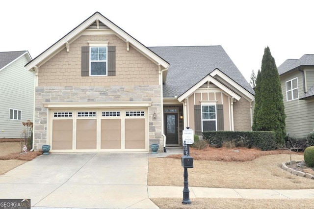 craftsman-style house featuring a garage