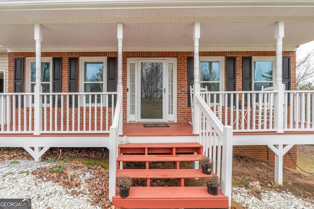 doorway to property with covered porch