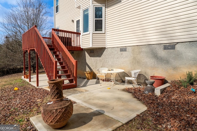 view of patio with a wooden deck