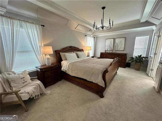 carpeted bedroom with ornamental molding and a chandelier