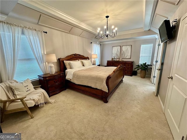 bedroom featuring a tray ceiling, ornamental molding, light colored carpet, and a chandelier