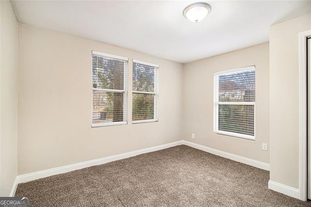 view of carpeted spare room