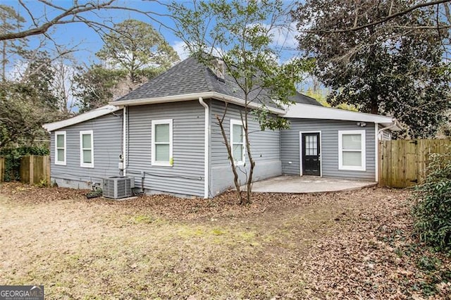 back of house featuring a patio and central air condition unit