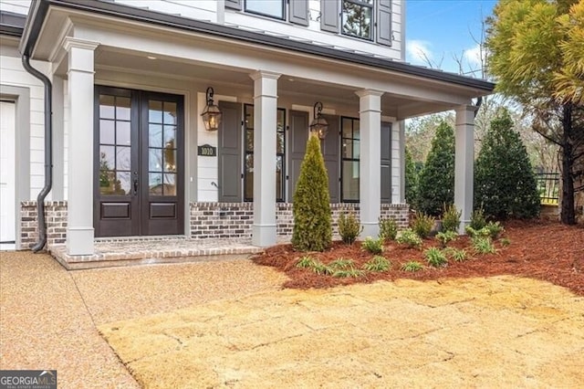 doorway to property featuring french doors