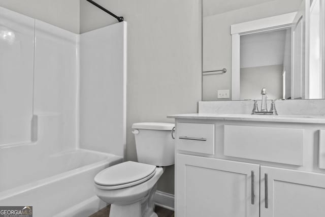 full bathroom featuring shower / washtub combination, vanity, and toilet