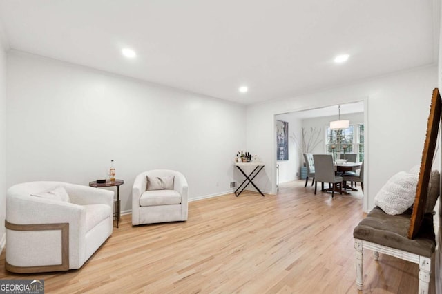 sitting room with light wood-type flooring