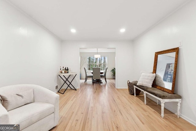 sitting room featuring hardwood / wood-style flooring