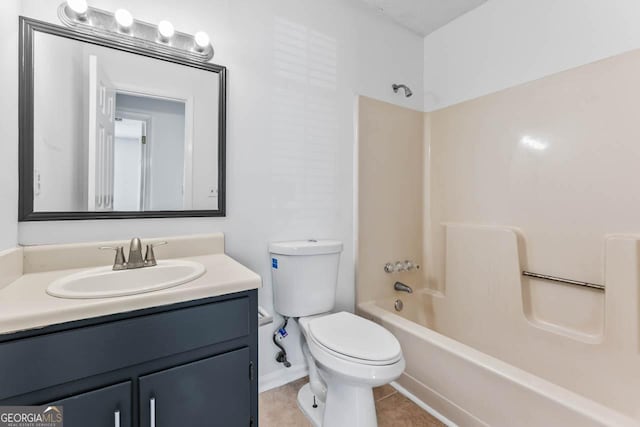 full bathroom featuring tile patterned flooring, vanity, bathtub / shower combination, and toilet