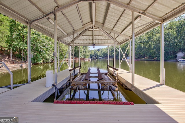 dock area featuring a water view