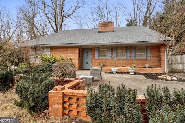 view of front of property with a patio