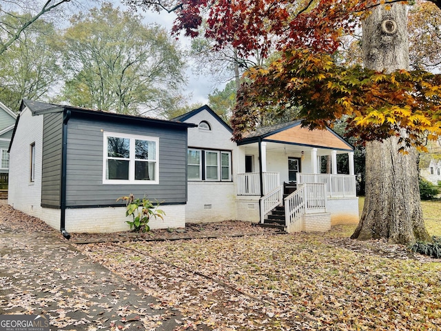 bungalow-style home with covered porch