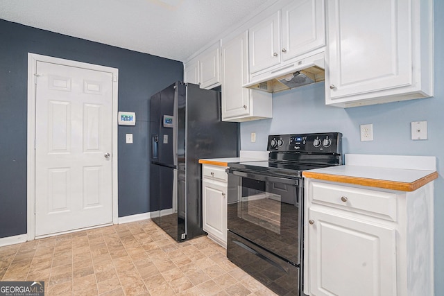 kitchen with white cabinetry and black appliances