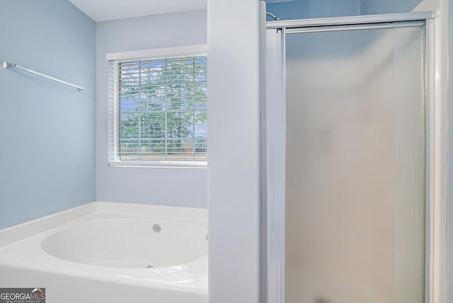 bathroom with plus walk in shower