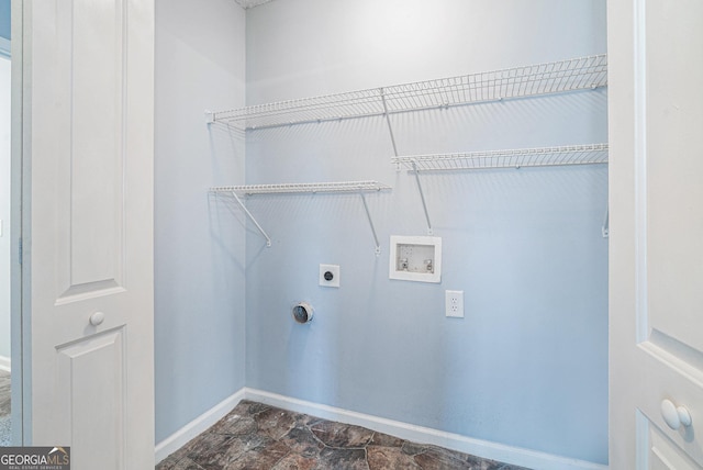 clothes washing area with washer hookup and hookup for an electric dryer