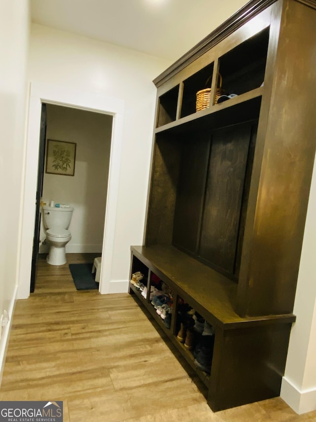 mudroom with light hardwood / wood-style flooring