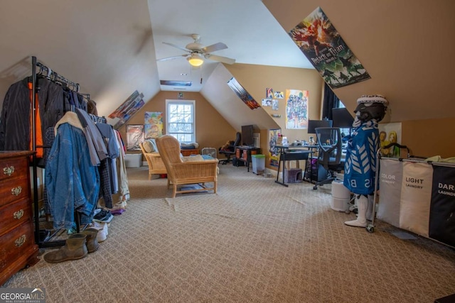 additional living space with vaulted ceiling, carpet flooring, and ceiling fan