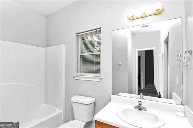 full bathroom featuring vanity, toilet, and shower / bathing tub combination