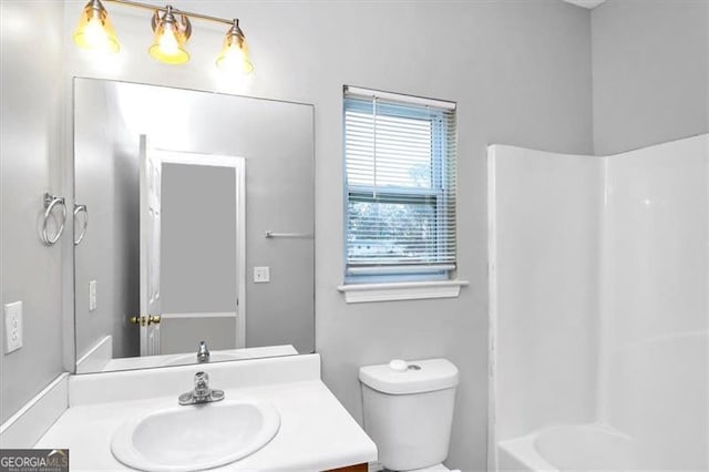 full bathroom featuring vanity, toilet, and shower / bathing tub combination