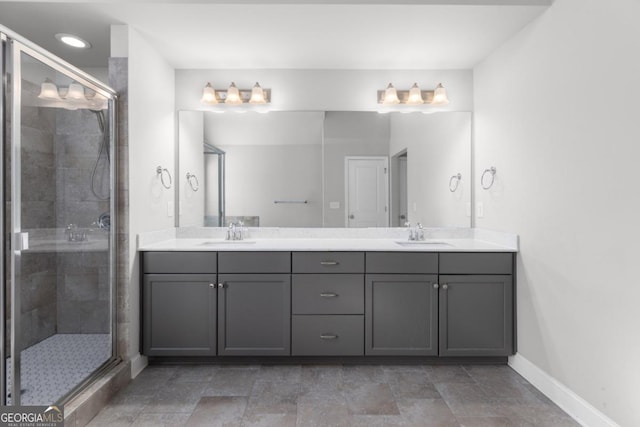 bathroom with vanity and an enclosed shower