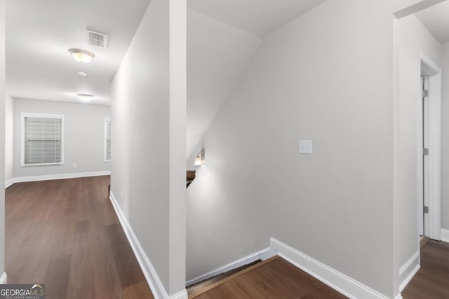 hall featuring dark wood-type flooring