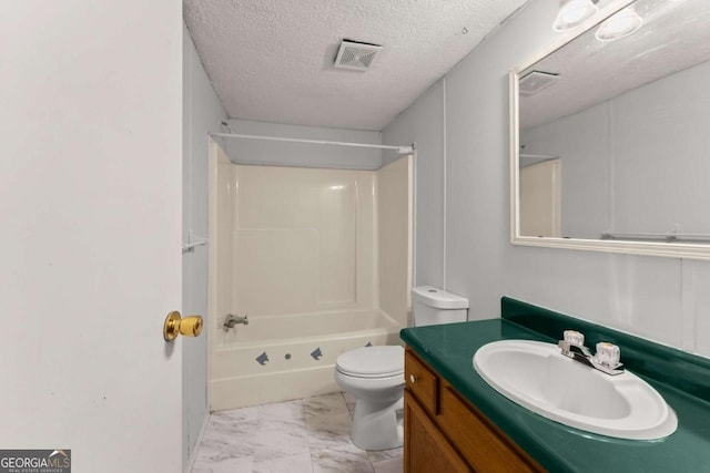 full bathroom with vanity, a textured ceiling, toilet, and washtub / shower combination