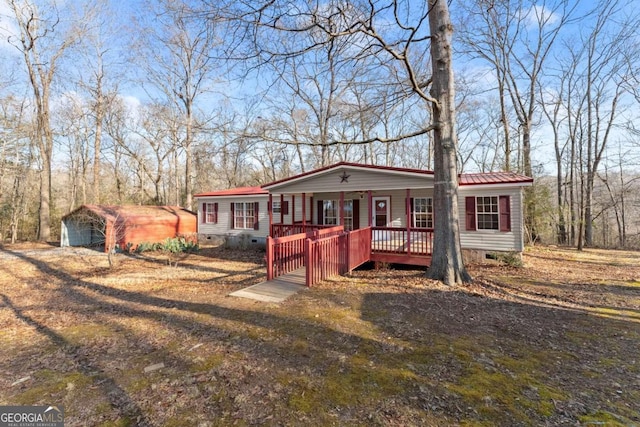 view of front of home featuring covered porch