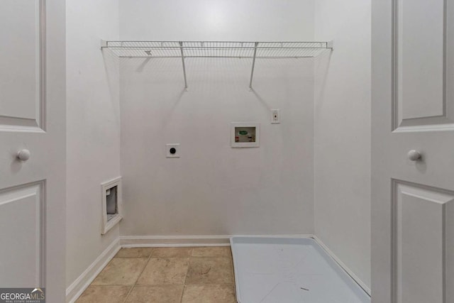 laundry room featuring light tile patterned flooring, hookup for an electric dryer, and hookup for a washing machine